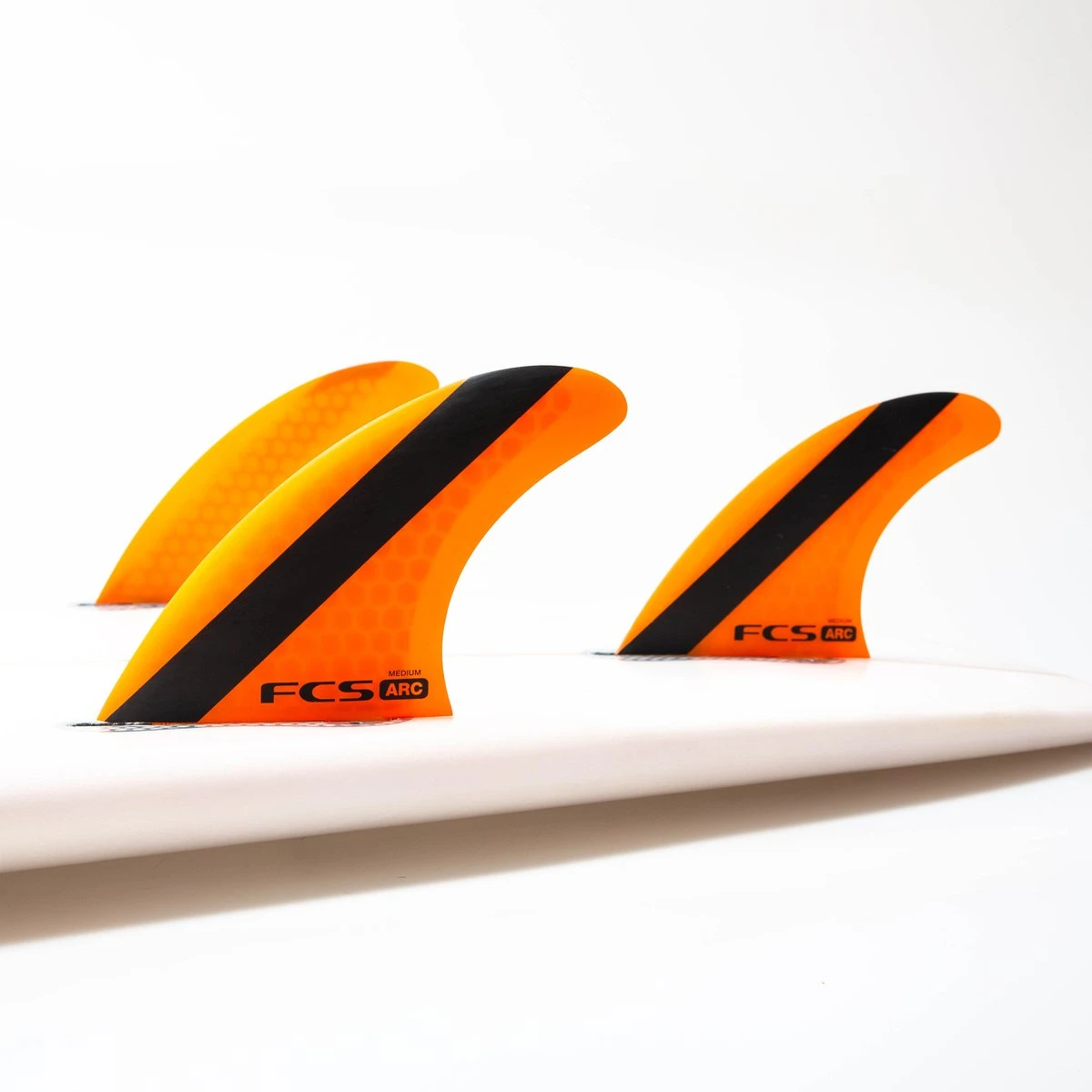 FCS ARC PC Tri Fin Set-Orange-Medium 4 FCS ARC PC Tri Fin Set-Orange-Medium - Image 2